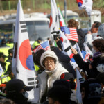 Pro-Yoon supporters participate in a rally outside the Seoul Detention Center in Uiwang, where impeached South Korean President Yoon Suk Yeol is held in custody, in Uiwang, South Korea, January 18, 2025. REUTERS/Kim Soo-hyeon