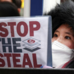 Pro-Yoon protesters participate in a rally outside a court as South Korea's impeached President Yoon Suk Yeol plans to attend a court hearing to fight a request by investigators to extend his detention on accusations of insurrection, in Seoul, South Korea, January 18, 2025. REUTERS/Kim Hong-Ji
