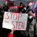 Pro-Yoon protesters participate in a rally outside a court as South Korea's impeached President Yoon Suk Yeol plans to attend a court hearing to fight a request by investigators to extend his detention on accusations of insurrection, in Seoul, South Korea, January 18, 2025. REUTERS/Kim Hong-Ji