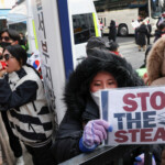 Pro-Yoon protesters participate in a rally outside a court as South Korea's impeached President Yoon Suk Yeol plans to attend a court hearing to fight a request by investigators to extend his detention on accusations of insurrection, in Seoul, South Korea, January 18, 2025. REUTERS/Kim Hong-Ji