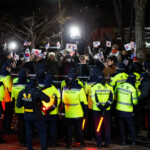 Supporters of impeached President Yoon Suk Yeol participate in a rally outside the Seoul Detention Center in Uiwang, South Korea, January 18, 2025. REUTERS/Kim Soo-hyeon
