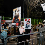Demonstrators protest against impeached South Korea's President Yoon Suk Yeol outside the Seoul Detention Center in Uiwang, South Korea, January 18, 2025. REUTERS/Kim Soo-hyeon