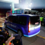 A motorcade believed to be carrying South Korea's impeached President Yoon Suk Yeo arrives at the Seoul Detention Center in Uiwang, South Korea, January 18, 2025. REUTERS/Kim Soo-hyeon