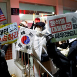 Supporters of impeached South Korea's President Yoon Suk Yeol participate in a rally outside the Seoul Detention Center in Uiwang, South Korea, January 18, 2025. REUTERS/Kim Soo-hyeon