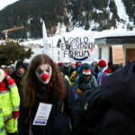 Climate activists and anti-WEF protesters attend a demonstration ahead of the opening of the World Economic Forum, in Davos, Switzerland January 19, 2025. REUTERS/Yves Herman