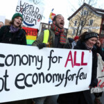 Climate activists and anti-WEF protesters attend a demonstration ahead of the opening of the World Economic Forum, in Davos, Switzerland January 19, 2025. REUTERS/Yves Herman