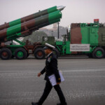 A Naval officer walks past Army's BrahMos weapon systems during a rehearsal for the upcoming Republic Day parade in New Delhi, India, January 20, 2025. REUTERS/Adnan Abidi