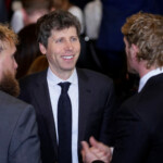 Sam Altman, chief executive officer of OpenAI Inc., center, with boxer Jake Paul and wrestler Logan Paul during the 60th presidential inauguration in Emancipation Hall of the US Capitol in Washington, DC, US, on Monday, Jan. 20, 2025. Donald Trump's Monday swearing-in marks just the second time in US history that a president lost the office and managed to return to power - a comeback cementing his place within the Republican Party as an enduring, transformational figure rather than a one-term aberration. Al Drago/Pool via REUTERS