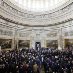 People attend the presidential inauguration of Donald Trump in the Rotunda of the U.S. Capitol in Washington, U.S. January 20, 2025. REUTERS/Fabrizio Bensch/Pool