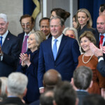 Former US President George W. Bush winks as he arrives for the inauguration ceremony before Donald Trump is sworn in as the 47th US President in the US Capitol Rotunda in Washington, DC, on January 20, 2025. Also pictured, L-R, incoming White House Chief of Staff Susie Wiles, former US President Bill Clinton, former Secretary of State Hillary Clinton and former First Lady Laura Bush. SAUL LOEB/Pool via REUTERS