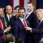 US President Donald Trump (R) with his son Donald Trump Jr. (C) and US Vice President JD Vance after being sworn in during an inauguration ceremony in the rotunda of the United States Capitol in Washington, DC, USA, 20 January 2025. Trump, who defeated Kamala Harris, is being sworn in today as the 47th president of the United States, though the planned outdoor ceremonies and events have been cancelled due to a forecast of extreme cold temperatures. SHAWN THEW/Pool via REUTERS