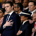 Barron Trump and first lady Melania Trump listen to Christopher Macchio sing during the 60th Presidential Inauguration in the Rotunda of the U.S. Capitol in Washington, Monday, Jan. 20, 2025. Julia Demaree Nikhinson/Pool via REUTERS