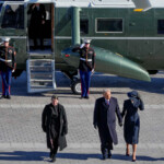 Jan 20, 2025; Washington, DC, USA; President Donald Trump and first lady Melania Trump walk together after the departure of former President Joe Biden and former first lady Jill Biden during the 2025 Presidential Inauguration at the U.S. Capitol. Jack Gruber/Pool via REUTERS