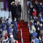 U.S. President Donald Trump and first lady Melania Trump arrive at Capital One arena on the inauguration day of Trump's second presidential term, in Washington, U.S., January 20, 2025. REUTERS/Brian Snyder