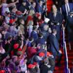 U.S. President Donald Trump and first lady Melania Trump arrive at Capital One arena on the inauguration day of Trump's second presidential term, in Washington, U.S., January 20, 2025. REUTERS/Brian Snyder