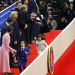 Vivek and Mirabel, children of U.S. Vice President J.D. Vance and second lady Usha Vance, run by their parents at Capital One arena on the inauguration day of Donald Trump's second presidential term, in Washington, U.S., January 20, 2025. REUTERS/Brian Snyder