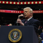 U.S. President Donald Trump speaks during the inaugural parade inside Capital One Arena on the inauguration day of his second presidential term, in Washington, U.S. January 20, 2025. REUTERS/Carlos Barria