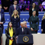 U.S. President Donald Trump speaks as Eric Trump, Lara Trump, Ivanka Trump and Tiffany Trump listen during a rally on the inauguration day of his second Presidential term, inside Capital One, in Washington, U.S. January 20, 2025. REUTERS/Mike Segar