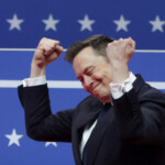 SpaceX CEO Elon Musk gestures during a rally on the inauguration day of U.S. President Donald Trump's second Presidential term, inside Capital One, in Washington, U.S. January 20, 2025. REUTERS/Mike Segar