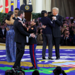U.S. President Donald Trump, U.S. Vice President JD Vance and his wife Usha Vance, dance with members of the U.S. military at the Commander in Chief Ball in honor of Trump's inauguration in Washington, U.S., January 20, 2025. REUTERS/Daniel Cole