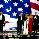 U.S. President Donald Trump gestures next to his wife First Lady Melania Trump as they attend the Liberty Ball on Inauguration Day of his second presidential term in Washington, U.S., January 20, 2025. REUTERS/Elizabeth Frantz
