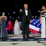 U.S. President Donald Trump gestures as he stands next to his wife, First Lady Melania Trump, U.S. Vice President J.D. Vance and his wife Usha Vance during the Liberty Ball on Inauguration Day of Donald Trump's second presidential term in Washington, U.S., January 20, 2025. REUTERS/Carlos Barria