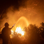 Firefighters battle the Hughes Fire near Castaic Lake, north of Santa Clarita, California, U.S. January 22, 2025. REUTERS/Ringo Chiu