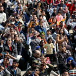 People watch India's Republic Day celebrations in New Delhi, India, January 26, 2025. REUTERS/Adnan Abidi