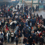 Palestinians wait to be allowed to return to their homes in northern Gaza after they were displaced to the south at Israel's order during the war, amid a ceasefire between Israel and Hamas, in the central Gaza Strip, January 27, 2025. REUTERS/Mohammed Salem