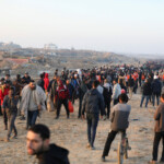 Palestinians, who were displaced to the south at Israel's order during the war, arrive on foot as they make their way back to their homes in the northern Gaza, amid a ceasefire between Israel and Hamas, in Gaza City, January 27, 2025. REUTERS/Dawoud Abu Alkas