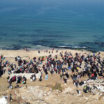 A drone view shows Palestinians, who were displaced to the south at Israel's order during the war, making their way back to their homes in northern Gaza, amid a ceasefire between Israel and Hamas, in the central Gaza Strip, January 27, 2025. REUTERS/Mohammed Salem