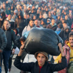 Palestinians, who were displaced to the south at Israel's order during the war, make their way back to their homes in northern Gaza, amid a ceasefire between Israel and Hamas, in the central Gaza Strip, January 27, 2025. REUTERS/Ramadan Abed