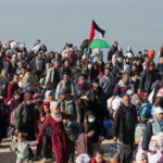 Palestinians, who were displaced to the south at Israel's order during the war, make their way back to their homes in northern Gaza, amid a ceasefire between Israel and Hamas, in the central Gaza Strip, January 27, 2025. REUTERS/Ramadan Abed