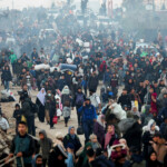 Palestinians, who were displaced to the south at Israel's order during the war, make their way back to their homes in northern Gaza, amid a ceasefire between Israel and Hamas, in the central Gaza Strip, January 27, 2025. REUTERS/Ramadan Abed