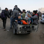 Palestinians, who were displaced to the south at Israel's order during the war, make their way as they return to their homes in the northern Gaza, amid a ceasefire between Israel and Hamas, in Gaza City, January 27, 2025. REUTERS/Dawoud Abu Alkas