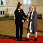 French President Emmanuel Macron welcomes Indian Prime Minister Narendra Modi, on the day of a meeting with international investors in IA at the Elysee Palace as part of the Artificial Intelligence (AI) Action Summit in Paris, France, February 10, 2025. REUTERS/Gonzalo Fuentes