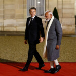 French President Emmanuel Macron welcomes Indian Prime Minister Narendra Modi, on the day of a meeting with international investors in IA at the Elysee Palace as part of the Artificial Intelligence (AI) Action Summit in Paris, France, February 10, 2025. REUTERS/Gonzalo Fuentes