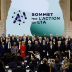 French President Emmanuel Macron, Indian Prime Minister Narendra Modi and United Nations Secretary-General Antonio Guterres pose for a family photo with heads of state and government and business leaders after the plenary session of the Artificial Intelligence (AI) Action Summit at the Grand Palais in Paris, France, February 11, 2025. REUTERS/Benoit Tessier