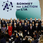 French President Emmanuel Macron, Indian Prime Minister Narendra Modi and United Nations Secretary-General Antonio Guterres pose for a family photo with heads of state and government and business leaders after the plenary session of the Artificial Intelligence (AI) Action Summit at the Grand Palais in Paris, France, February 11, 2025. REUTERS/Benoit Tessier