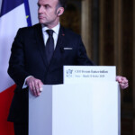 French President Emmanuel Macron listens to the speech of Indian Prime Minister Narendra Modi (not seen) during the closing session of the Franco-Indian Economic Forum at the Quai d'Orsay following the Artificial Intelligence (AI) Action Summit in Paris, France, February 11, 2025. REUTERS/Abdul Saboor/Pool