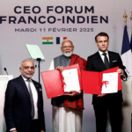 Indian Prime Minister Narendra Modi and French President Emmanuel Macron pose during the closing session of the Franco-Indian Economic Forum at the Quai d'Orsay following the Artificial Intelligence (AI) Action Summit in Paris, France, February 11, 2025. REUTERS/Abdul Saboor/Pool