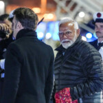 French President Emmanuel Macron and Prime Minister Narendra Modi arrive after the Artificial Intelligence Action Summit in Paris at Marseille Provence airport in Marignane, southern France, Feb. 11, 2025. Laurent Cipriani/Pool via REUTERS