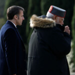 French President Emmanuel Macron and Indian Prime Minister Narendra Modi attend a ceremony to remember Indian soldiers killed in World War One at the Mazargues cemetery as part of a visit in Marseille, France, February 12, 2025. REUTERS/Christian Hartmann/Pool
