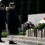 French President Emmanuel Macron and Indian Prime Minister Narendra Modi attend a ceremony to remember Indian soldiers killed in World War One at the Mazargues cemetery as part of a visit in Marseille, France, February 12, 2025. REUTERS/Christian Hartmann/Pool
