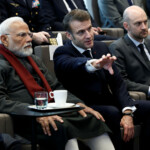 French President Emmanuel Macron, Indian Prime Minister Narendra Modi and French Minister for Europe and Foreign Affairs Jean-Noel Barrot visit the CMA CGM Tower of the French shipping company in the Port of Marseille, France, February 12, 2025. REUTERS/Christian Hartmann/Pool