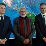 French President Emmanuel Macron, Indian Prime Minister Narendra Modi and Rodolphe Saade, Chairman and CEO of CMA CGM, pose during a visit at the CMA CGM Tower of the French shipping company in the Port of Marseille, France, February 12, 2025. REUTERS/Christian Hartmann/Pool