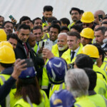 French President Emmanuel Macron and Indian Prime Minister Narendra Modi pose for selfies as they visit the ITER (International Thermonuclear Experimental Reactor) in Saint-Paul-les-Durance, southern France, Wednesday, Feb. 12, 2025. Laurent Cipriani/Pool via REUTERS