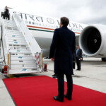 French President Emmanuel Macron looks on as Indian Prime Minister Narendra Modi boards a plane after a departure ceremony at Marseille Provence airport in Marignane as part of a visit in Marseille, France, February 12, 2025.  REUTERS/Christian Hartmann/Pool