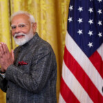 Indian Prime Minister Narendra Modi gestures as he arrives for a joint press conference with U.S. President Donald Trump at the White House in Washington, D.C., U.S., February 13, 2025. REUTERS/Kevin Lamarque