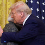 U.S. President Donald Trump and Indian Prime Minister Narendra Modi embrace as they attend a joint press conference at the White House in Washington, D.C., U.S., February 13, 2025. REUTERS/Kevin Lamarque